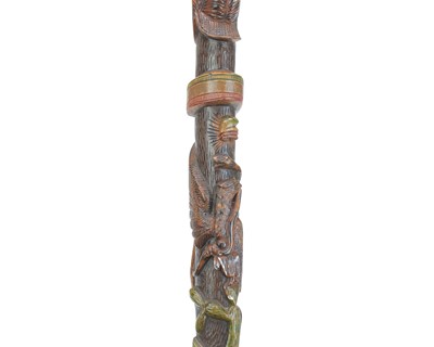 Lot 4 - A 20th century Mexican carved hardwood walking stick.