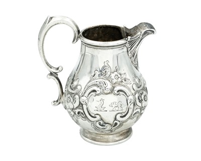 Lot 182 - A Victorian silver baluster cream jug by Richard Sibley II.