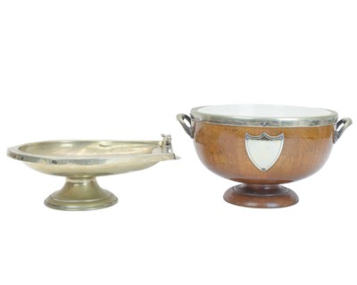 Lot 70 - An oak salad bowl with silver plated metal mounts and twin handles.