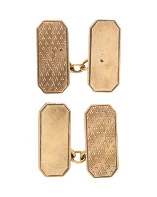Lot 55 - A pair of 9k gold and silver cufflinks.