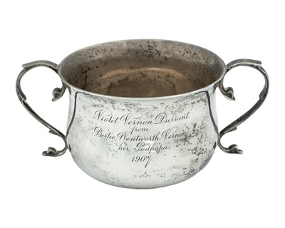 Lot 115 - An Edwardian silver twin-handled bowl by Wakely & Wheeler.