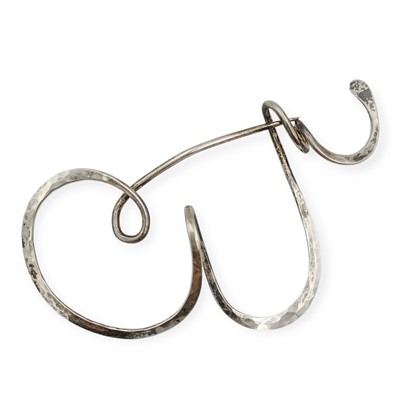 Lot 52 - A silver (tested) letter 'E' or 'W' pin.