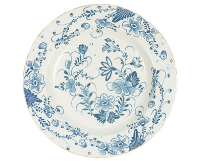 Lot 776 - A blue and white English Delft charger.