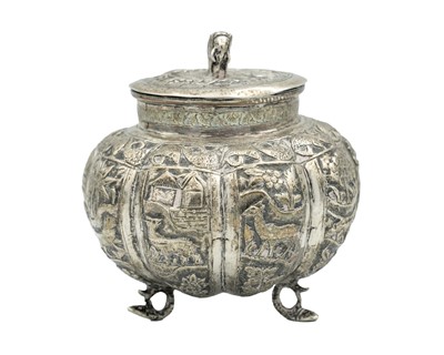 Lot 180 - A 19th-century Indian silver ovoid hinge-lidded tea caddy.