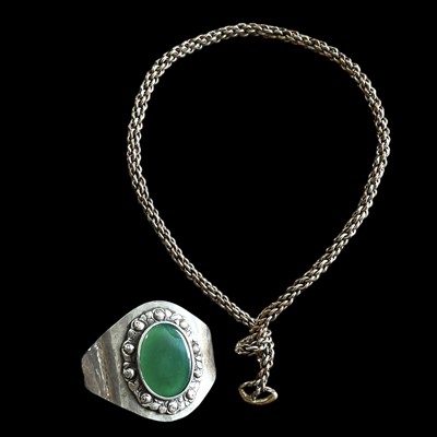Lot 131 - A 925 silver bracelet with a jadeite green...