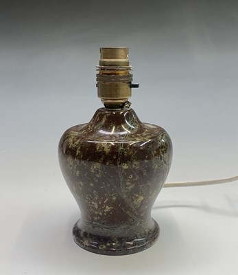 Lot 121 - A Cornish serpentine table lamp. Height 17.5cm...