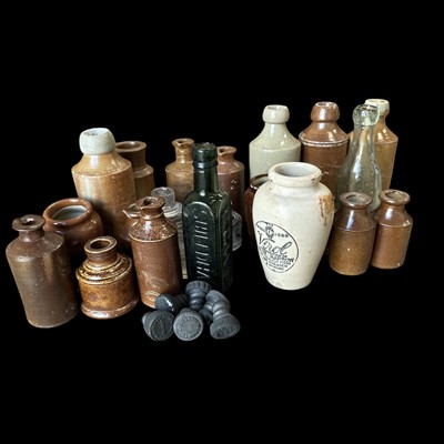 Lot 156 - A collection of stoneware bottles, glass pots...