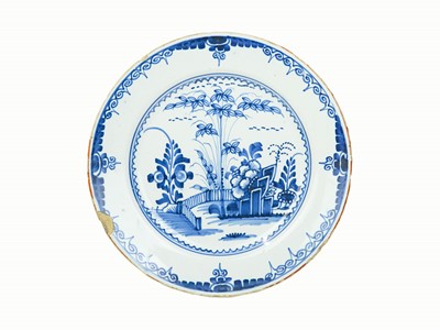 Lot 675 - An English Delft blue and white plate.