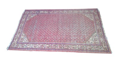 Lot 447 - A Persian wool rug.