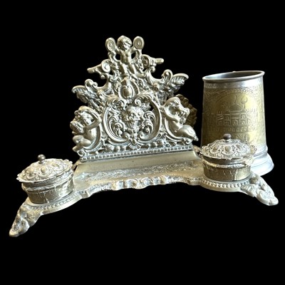 Lot 167 - A brass desk tidy with two inkwells and a...