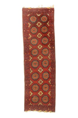 Lot 481 - An Afghan wool carpet runner.