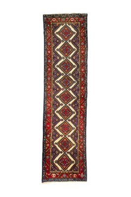 Lot 461 - A Persian wool carpet runner.