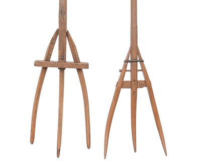 Lot 69 - Two wooden pitchforks.