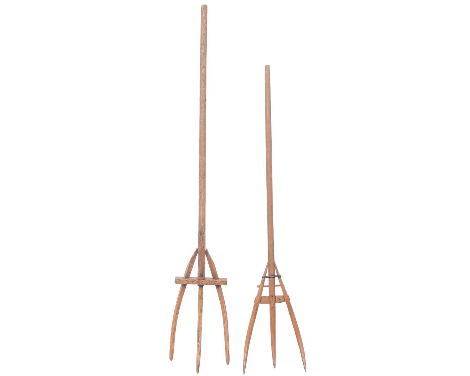 Lot 69 - Two wooden pitchforks.