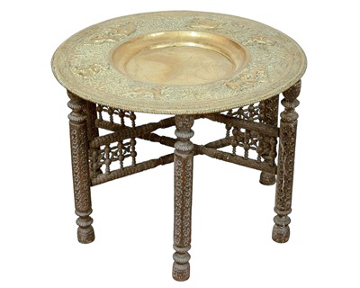 Lot 367 - An Indian large brass topped tray table.