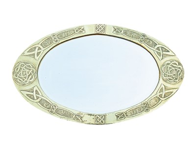 Lot 842 - An Arts and Crafts brass oval wall mirror.