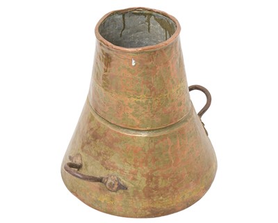 Lot 86 - An Eastern copper vessel with twin wrought iron handles.