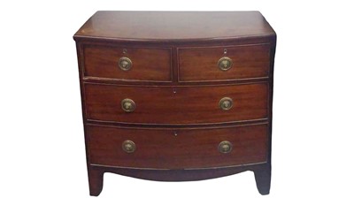 Lot 869 - A Victorian mahogany bow front chest.