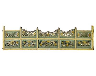 Lot 419 - An ornate Indian carved and painted hardwood panel.