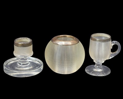 Lot 205 - Three silver mounted and glass match strikers.