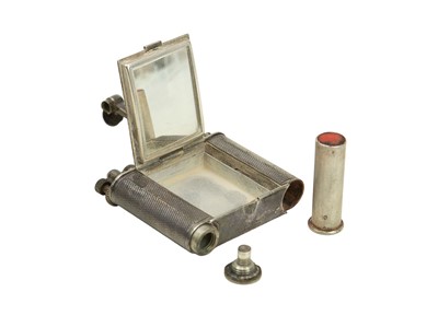 Lot 59 - An Art Deco Dunhill combination lighter and compact.