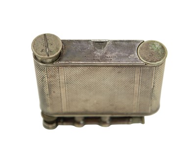 Lot 59 - An Art Deco Dunhill combination lighter and compact.
