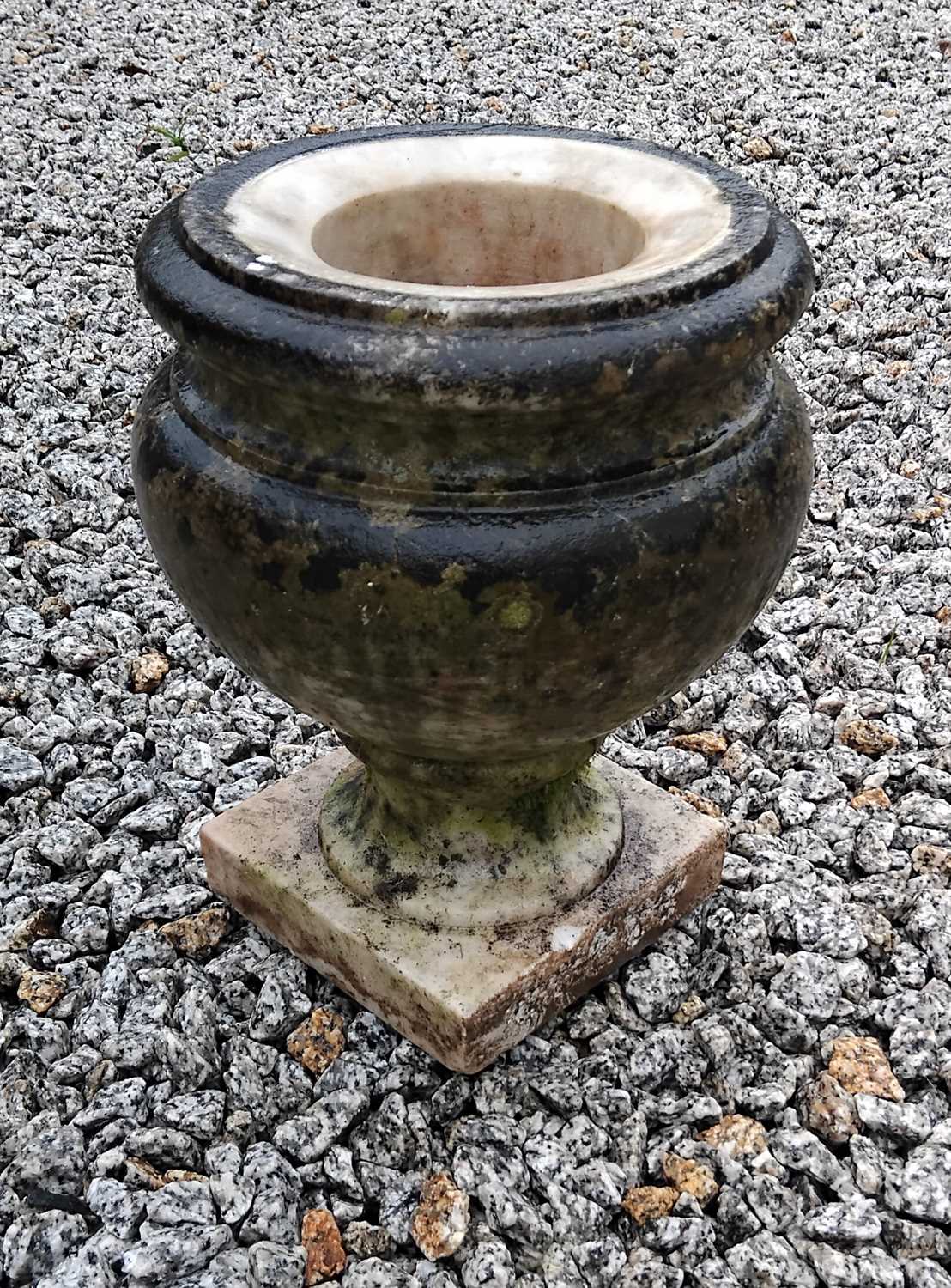 Lot 57 - A turned marble urn on square socle foot.