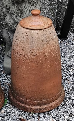 Lot 748 - A terracotta rhubarb forcer with lid.