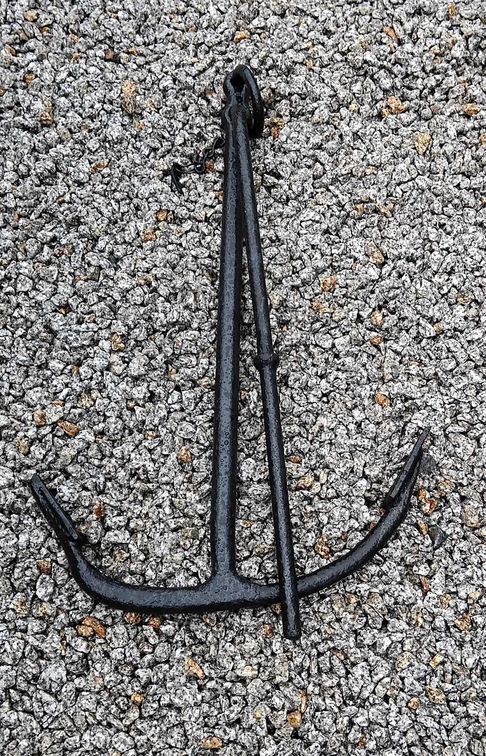 Lot 71 - A cast metal anchor.