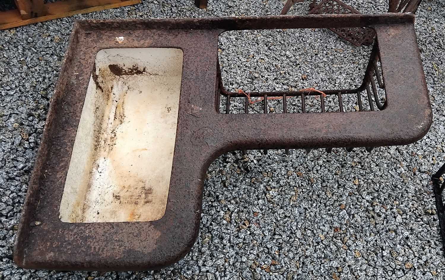 Lot 33 - A wall-mounted, cast iron, combination hay rack and water trough.