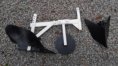 Lot 870 - An early 20th century farm plough attachment.