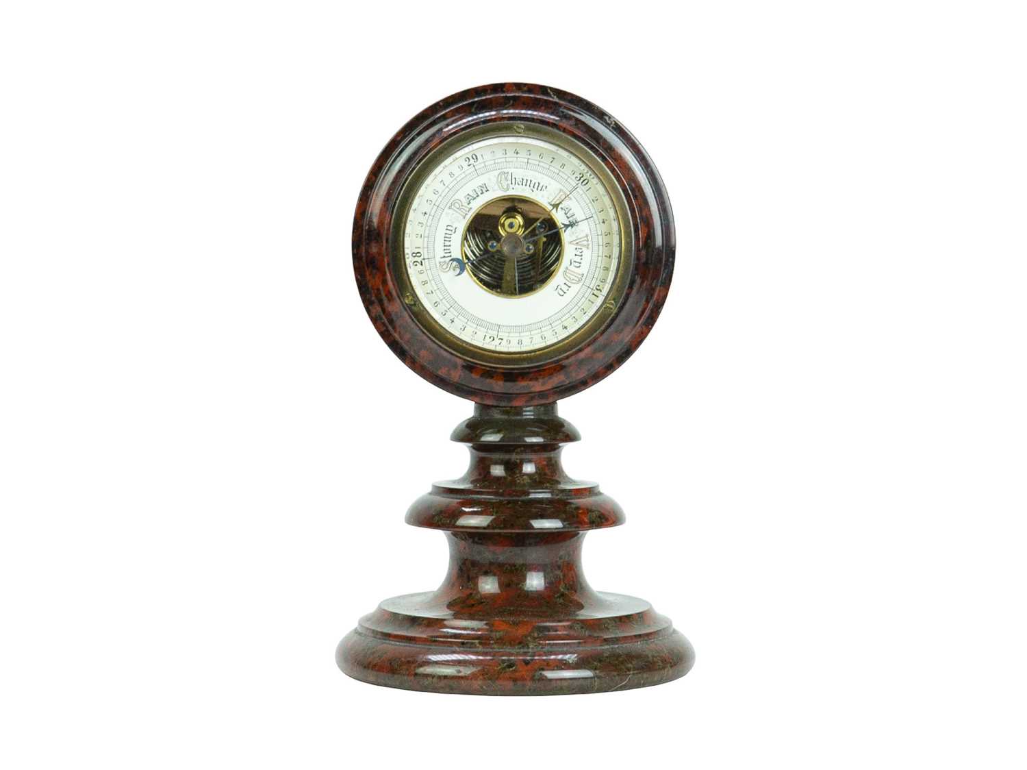 Lot 27 - A Cornish red serpentine cased aneroid barometer.