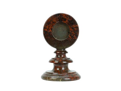 Lot 27 - A Cornish red serpentine cased aneroid barometer.