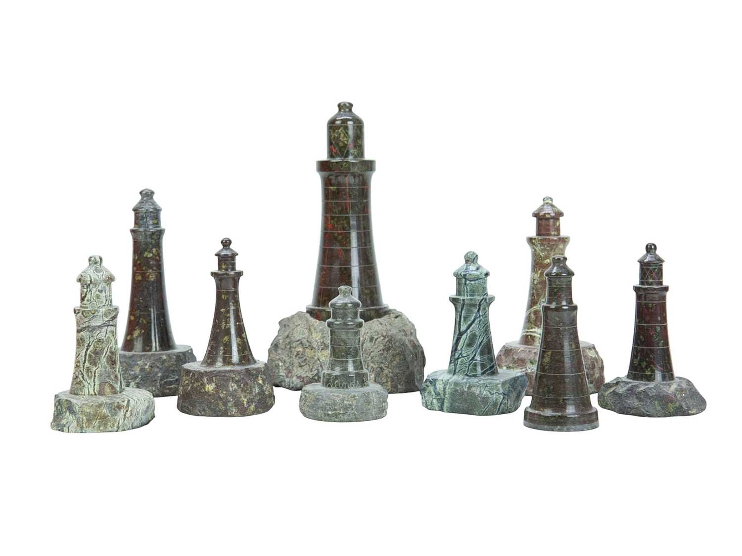 Lot 66 - A collection of nine Cornish serpentine turned models of lighthouses.