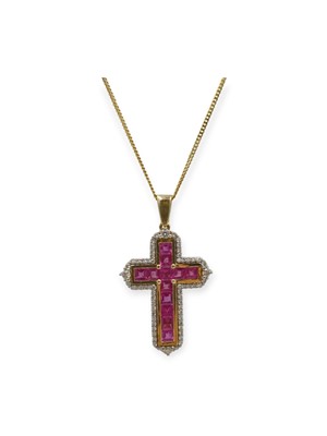 Lot 90 - A 14k gold ruby and diamond cross pendant on a silver gilt curb chain.