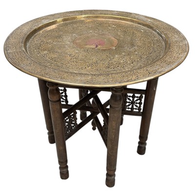 Lot 40 - An Indian Brass and wood folding Tray Table....