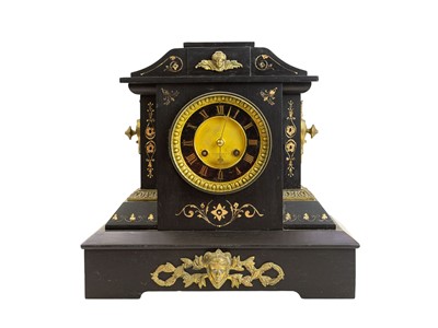 Lot 785 - A Victorian black slate mantel clock.