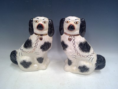 Lot 43 - Two Staffordshire Spaniels. The Spaniels are...