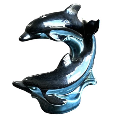 Lot 89 - A Poole pottery leaping dolphins figure, 16cm...