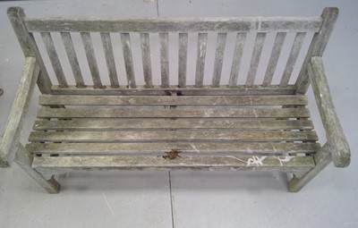 Lot 37 - A Hardwood Garden Bench. The Bench is 149cm...