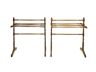 Lot 881 - A pair of late Victorian walnut towel rails.