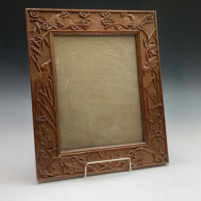 Lot 192 - An Aesthetic Movement oak frame, carved with...