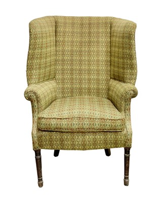 Lot 972 - A George III mahogany barrel back armchair.