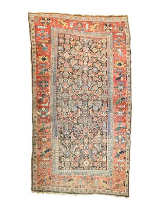 Lot 465 - An antique Persian rug.
