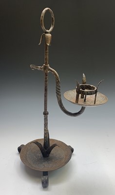 Lot 41 - An Arts and Crafts period wrought iron candle...