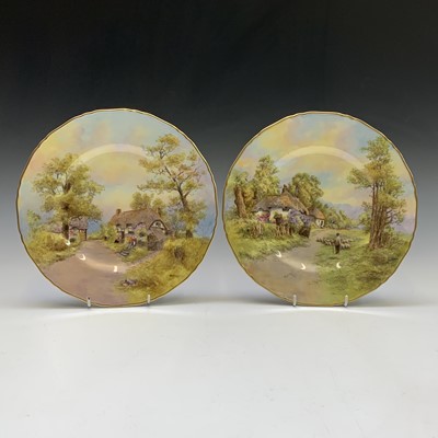 Lot 880 - Two Royal Worcester plates decorated with...