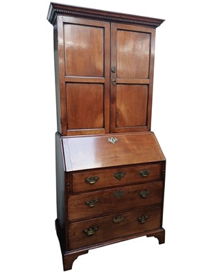 Lot 736 - An early George III fruitwood bureau bookcase.
