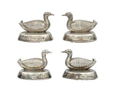 Lot 114 - SAMPSON MORDAN & CO - An Edwardian silver set of four menu card holders, modelled as ducks.
