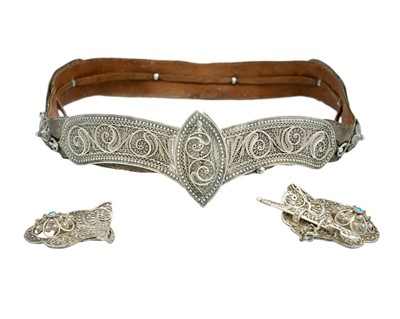 Lot 56 - A Russian Cossack silver filigree mounted leather belt, and a Cossack turquoise set buckle.