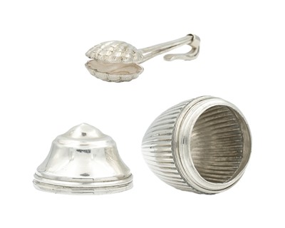 Lot 161 - A George III silver ovoid fluted nutmeg grater (lacks grille) and a modern silver napkin holder.